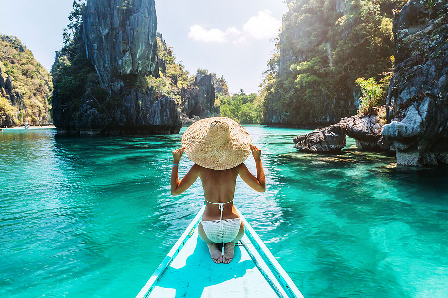 Woman on boat in Thailand