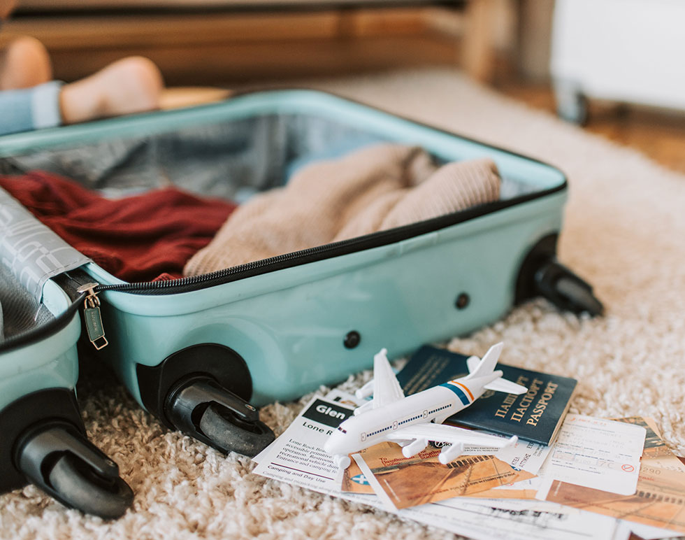 suitcase packed with passport